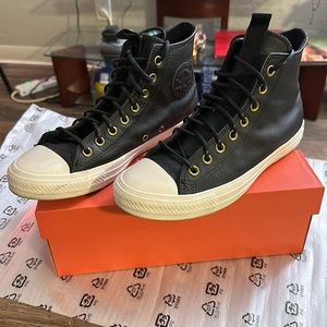 Converse black leather Chuck Taylor hi top sneakers